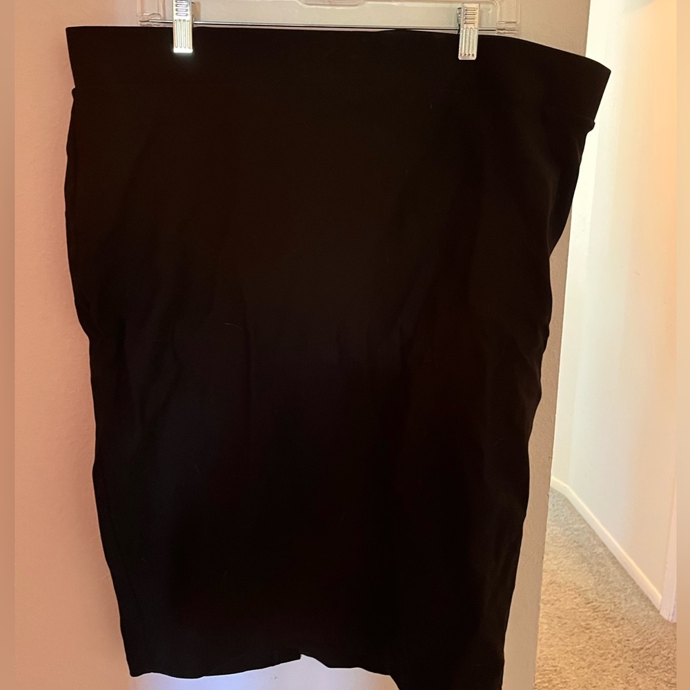 Black ponte pencil skirt from torrid. Size 2x. Great condition, worn twice
